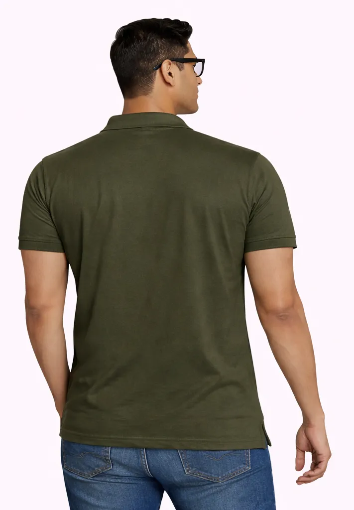 Model in olive green polo shirt.webp