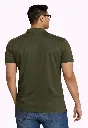 Model in olive green polo shirt.webp